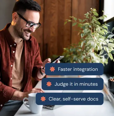 Developer reviewing a rewards API integration on a mobile phone