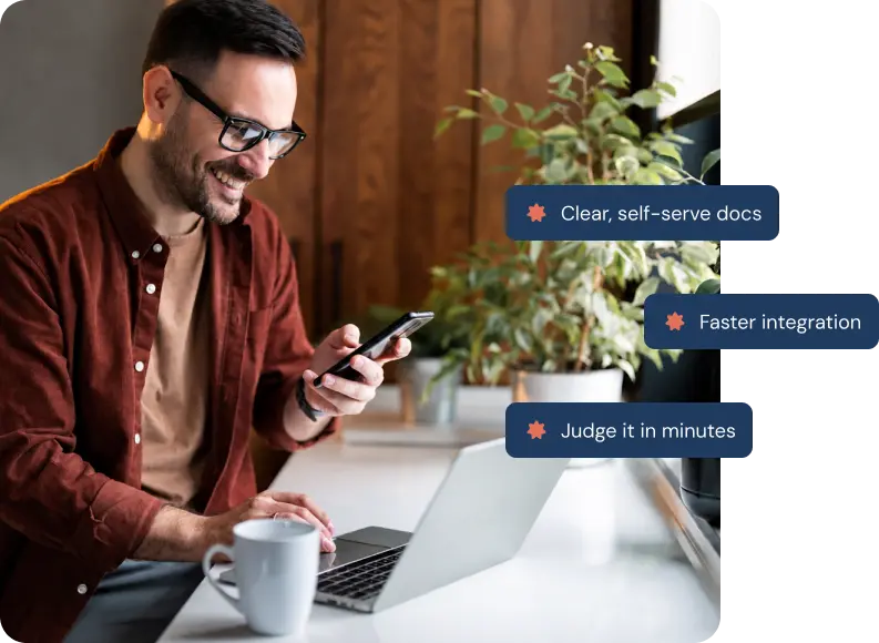 Developer reviewing a rewards API integration on a mobile phone