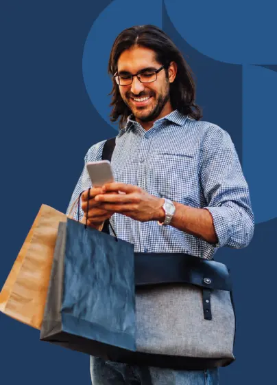 Woman using a mobile loyalty programme while shopping