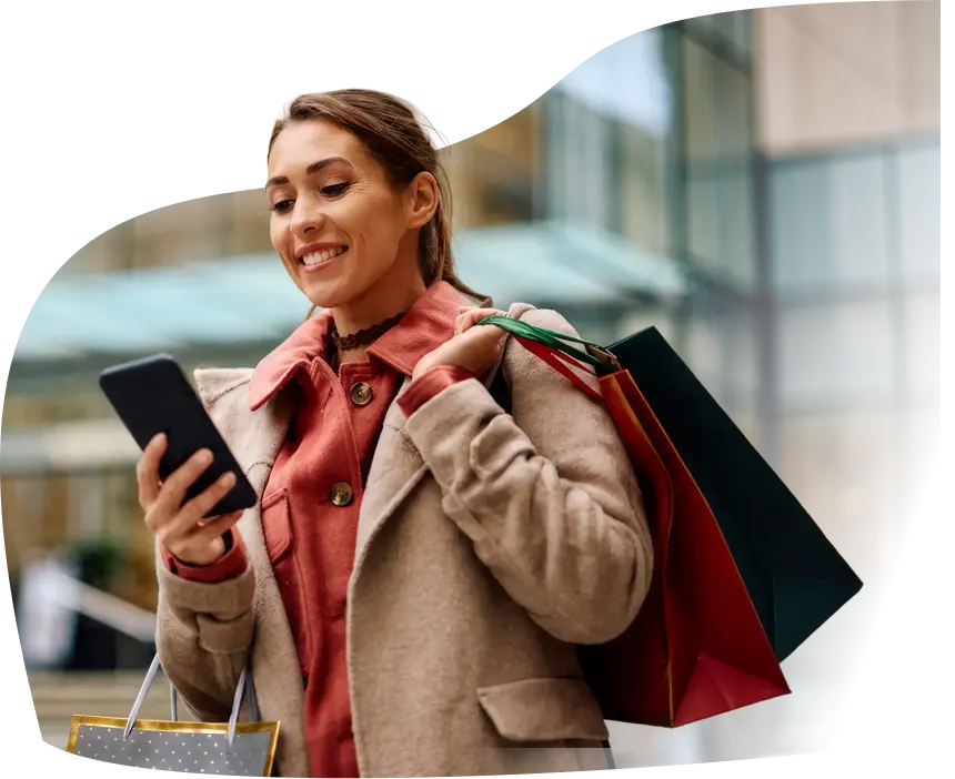 Customer checking rewards on a mobile phone while shopping
